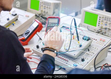 Two young students in technical vocational training, the lesson in technical college. Stock Photo