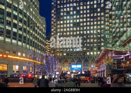 View of streets and buildings of Canary Wharf business district in London, UK in winter. Stock Photo