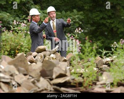 HRH Prince of Wales pictured during his visit to The Museum of Welsh Life, St Fagans, Cardiff today ( Tuesday 29/7/03 ). This visit forms parts of the Princes four day annual summer visit to Wales. The Prince is pictured looking at a pile of old stones which will be transformed into St Teilo's Church. Stock Photo