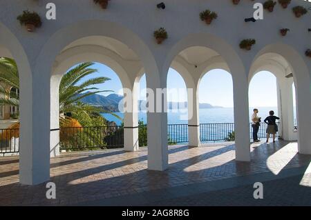 NERJA, SPAIN - Oct 16, 2012: A white building with arches near the sea in Nerja, Spain Stock Photo