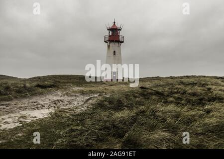 Low angle shot of the Lighthouse List East at Sylt, Germany under the storm clouds Stock Photo