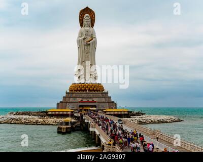 NANSHAN CULTURAL PARK, HAINAN, CHINA - 5 MAR 2019 – Tourists and devotees visit the famous statue of the Goddess of Mercy, Guanyin / Guan Yin / Kuan Y Stock Photo