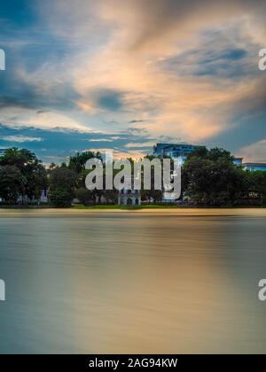 Turtle Tower at sunset on Hoan Kiem Lake, Hanoi, Vietnam Stock Photo