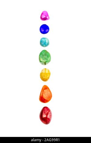 Chakra stones, crystals in a row on white background, isolated Stock Photo