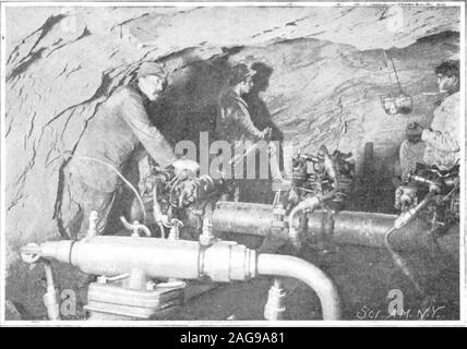 . Scientific American Volume 92 Number 11 (March 1905). Upper Power House. Iron Bridge Across the Diveria for the Flume. To theLeft, a Small Tunnel Leading to the Main Tunnel. Three Brandt Hydraulic Rock Drills, with Which all the Rock-Drilling Was Done. Stock Photo