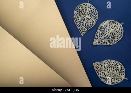 New Year's Christmas gold and blue balls on a dark background with scattered sequins Stock Photo