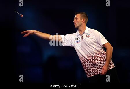 Madars Razma in action during day three of the William Hill World Darts ...