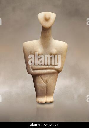 Marble female Cycladic statue figurine with folded arms. Early Cycladic Period II (2800-2300 BC) from Chalandriani, Syros. National Archaeological Mus Stock Photo