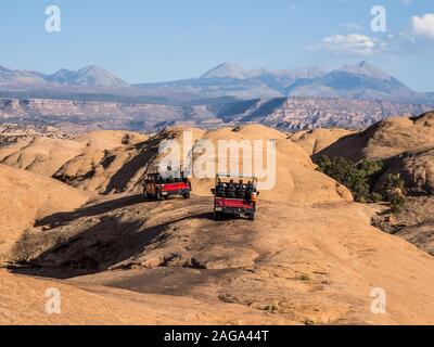 A 4x4 Hummer tour on the Hell's Revenge Trail in the Sandflats Recreation Area near Moab, Utah. Stock Photo