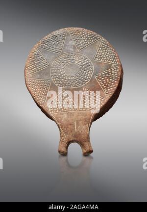 Cycladic terracotta 'frying pan' with incied star decoration from Chalandriani, Syros. Early Cycladic period II 2800-2300 BC), National Archaeological Stock Photo