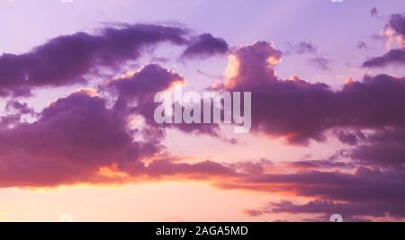 Colorful cloudy sky at sunrise, wide panoramic background photo Stock Photo