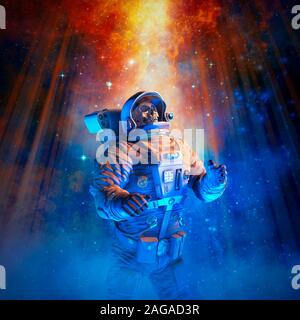 Final mission to the stars / 3D illustration of science fiction scene with skeleton astronaut in outer space amid glowing galaxies Stock Photo