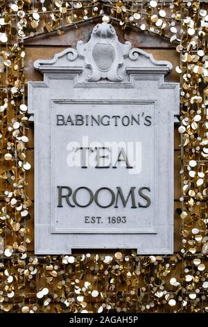 Golden Christmas decorations, Babington's English Tea Rooms and Cafe sign, at the Spanish Steps (Piazza di Spagna). Rome, Italy, Europe, EU. Stock Photo