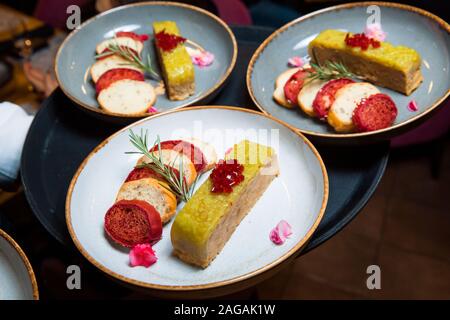 Duck terrine with autumn fruit and red wine jelly. Stock Photo