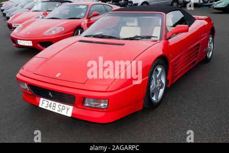 Three-quarters front view of a Red, 1993, Ferrari 348 Spider,  on display in the Ferrari Owners Club of GB zone, at the 2019 Silverstone Classic Stock Photo