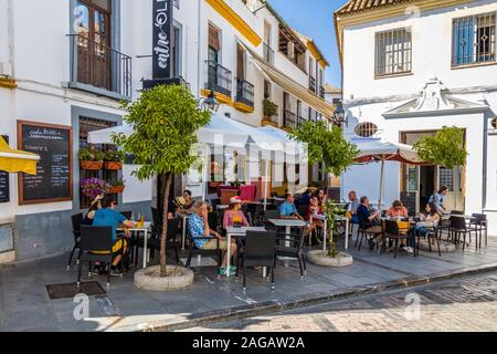 Sidewalk cafe in old section of Cordoba in  the Andalusia region of Spain Stock Photo