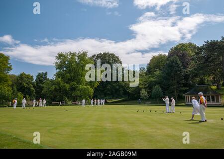 Bowlers playing Crown Green Bowls at the local bowling club in Alexandra park, Hastings, East Sussex, UK Stock Photo