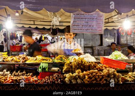 A Street Food Stall At The Phnom Penh Night Market, Phnom Penh, Cambodia. Stock Photo