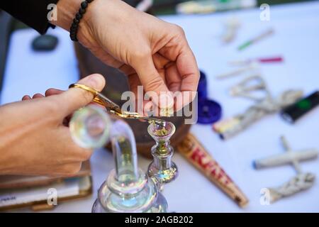 Trimming Bud at Cannabis Party Stock Photo