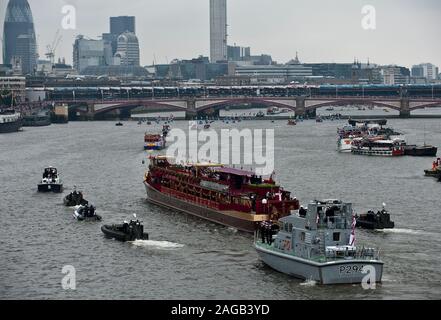 A thousand small boats join the Royal Family for The Pageant on the River Thames in 2012  to celebrate the Diamond Jubilee of Elizabeth II being the 60th anniversary of the accession of Her Majesty  Queen on 6 February 1952. Stock Photo