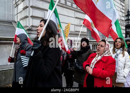 Iranians protest in London in sympathy with and supporting the demonstrations in Iran in opposition to the policies of Iranian government and brutal regime Stock Photo