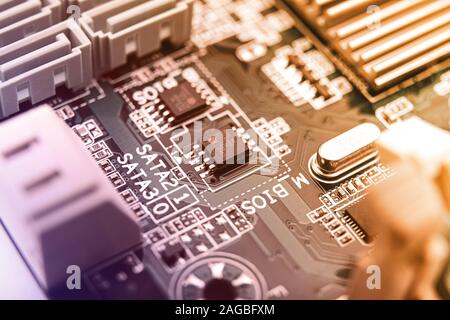 Modern printed circuit board, electronic circuit board, textolite. Background banner. Mother board, macro. Stock Photo