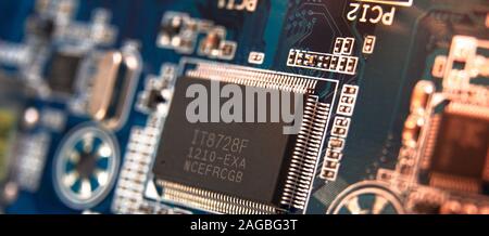 Modern printed circuit board, electronic circuit board, textolite. Background banner. Mother board, macro. Stock Photo