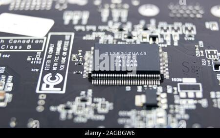 Modern printed circuit board, electronic circuit board, textolite. Background banner. Mother board, macro. Stock Photo