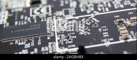 Modern printed circuit board, electronic circuit board, textolite. Background banner. Mother board, macro. Stock Photo