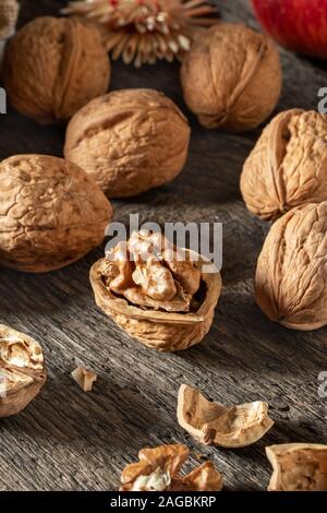 Closeup of whole and broken walnuts Stock Photo