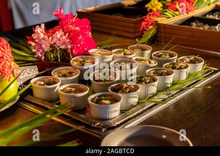 High angle shot of delicious seafood in the middle of a table in Bonaire, Caribbean Stock Photo