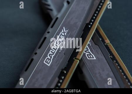 Valencia, Spain - December 07, 2019: Two memory modules. Fast Crucial Ballistix DDR4 RAM,  Micron memory. Famous Gamer DRAM sticks. Stock Photo