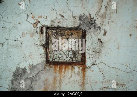 rusty frame on cracked, vintage wall - abstract background Stock Photo