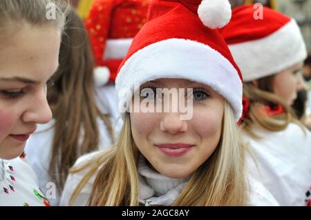 Cherkasy, Ukraine,January,14, 2014: Group of teenagers  dressed as Santa Claus took part in the city Christmas festival Stock Photo