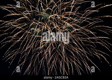 Firework lights over dark background Stock Photo