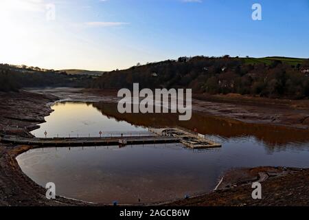 The drained and empty Toddbrook reservoir at Whaley Bridge looks lovely in the winter sun. The reservoir was drained after a spillway failure. Stock Photo