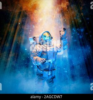 Reach for the heavens / 3D illustration of science fiction scene with astronaut reaching toward heavenly glow in outer space Stock Photo