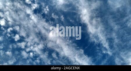 Sky clouds. Abstract blurred cyan gradient of spring sky. Stock Photo