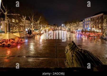 view from the historic monument 'waag' over the illuminated city center of Deventer, Overijssel Stock Photo