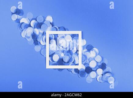 White frame on trendy background with confetti. Stock Photo