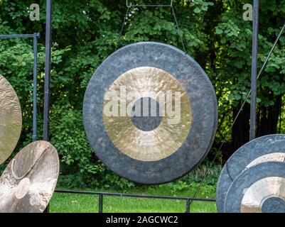 Close up view of Gong texture background. Abstract black and golden background for pattern design. Stock Photo