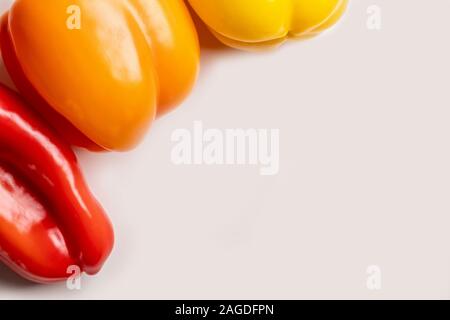 Colorful bell peppers close up isolated on white background with copy space Stock Photo