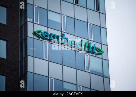 BRNO, CZECHIA - NOVEMBER 5, 2019: Embedit logo in front of their headquarters in Brno. Embed it is a Czech IT development firm specialized in financia Stock Photo