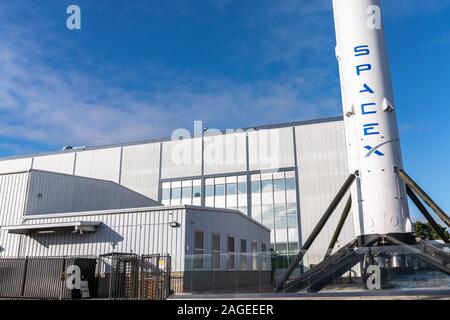 Dec 8, 2019 Hawthorne / Los Angeles / CA / USA - SpaceX (Space Exploration Technologies Corp.) headquarters; Falcon 9 rocket displayed in the front; S Stock Photo