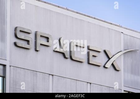 Dec 8, 2019 Hawthorne / Los Angeles / CA / USA - close up of SpaceX (Space Exploration Technologies Corp.) sign at their headquarters; SpaceX is a pri Stock Photo