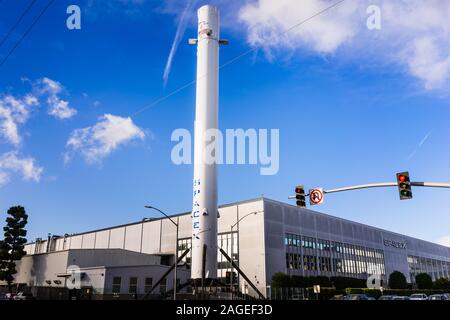 Dec 8, 2019 Hawthorne / Los Angeles / CA / USA - SpaceX (Space Exploration Technologies Corp.) headquarters; Falcon 9 rocket displayed in the front; S Stock Photo