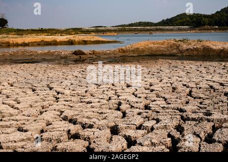 Cracked and dry soil in arid areas landscape Stock Photo