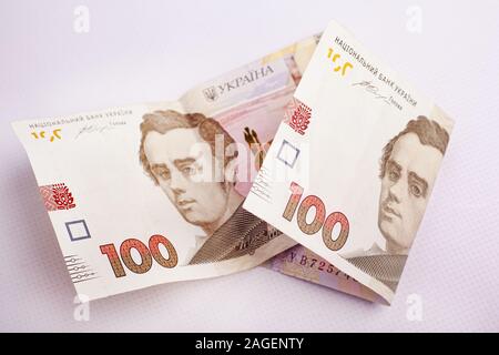 Ukrainian paper money on a white background closeup. Stock Photo