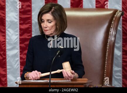 Washington, District of Columbia, USA. 18th Dec, 2019. Speaker of the United States House of Representatives Nancy Pelosi (Democrat of California) presides over Resolution 755, Articles of Impeachment Against US President Donald J. Credit: ZUMA Press, Inc./Alamy Live News Stock Photo