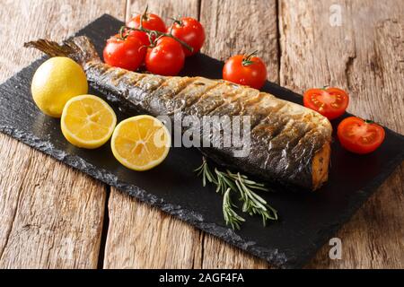 Healthy organic humpback salmon grill close-up on a slate board on a table. horizontal Stock Photo